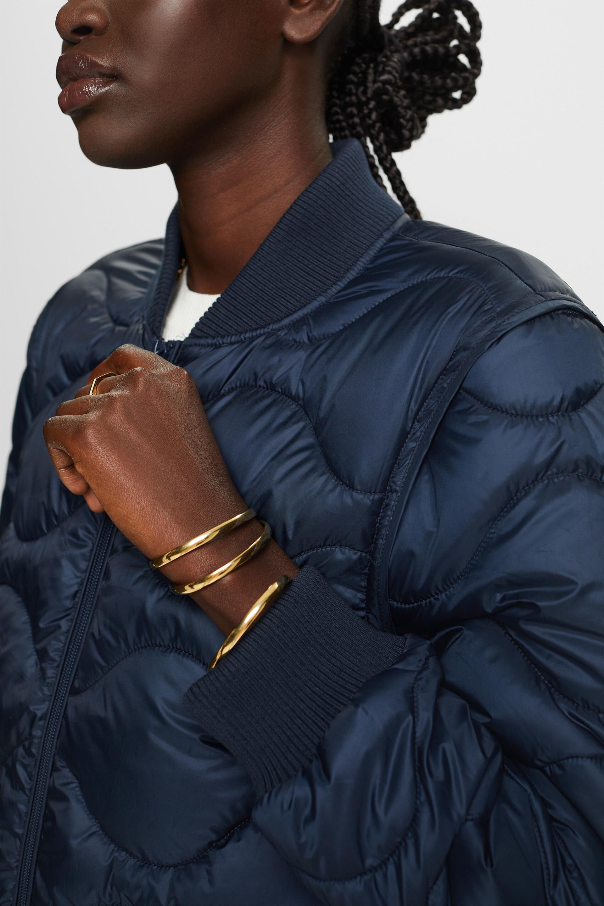 Recyclé le manteau matelassé transformable