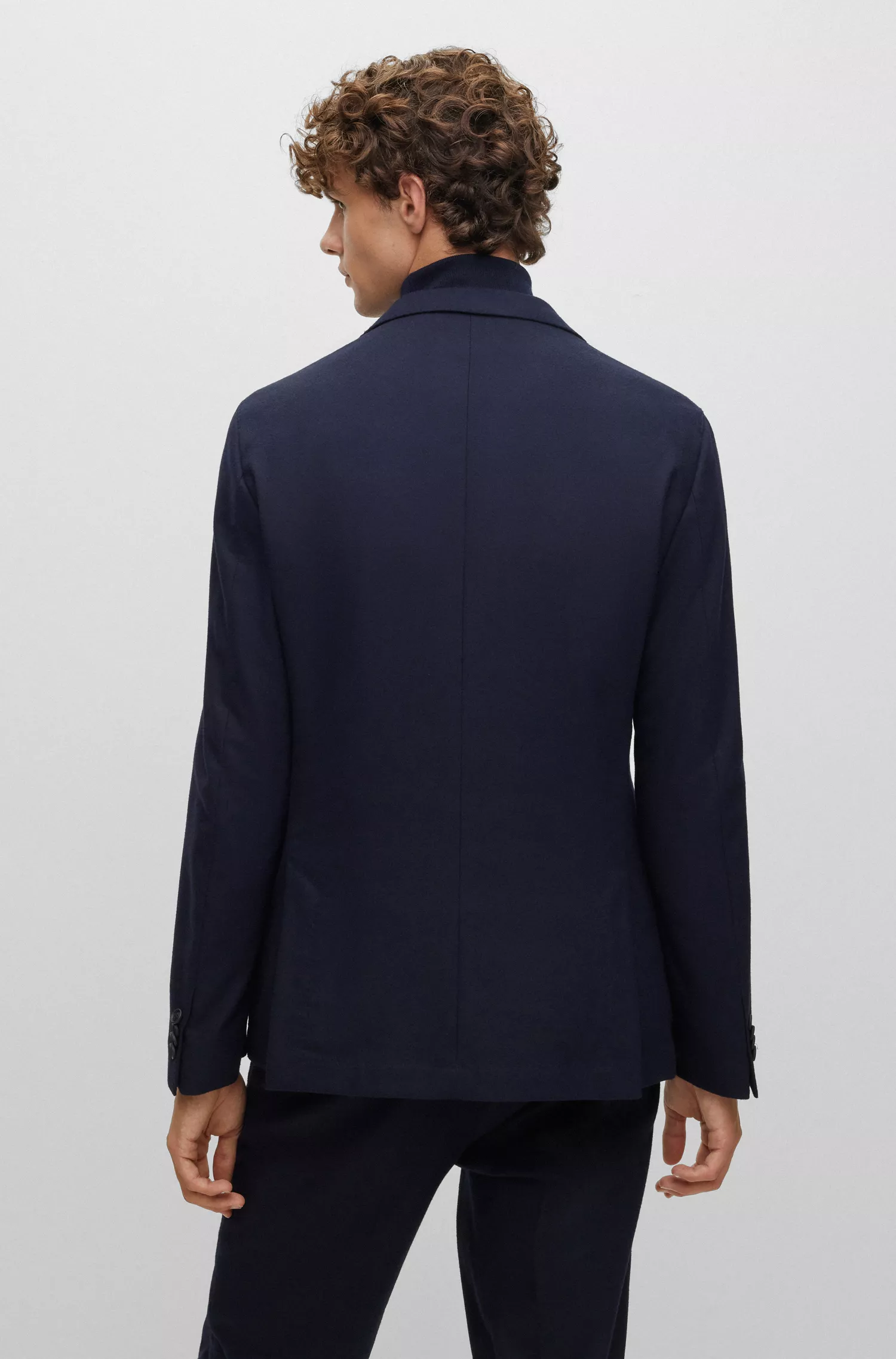 Blazer BOSS preto, corte slim, com um botão, em tecido elástico.