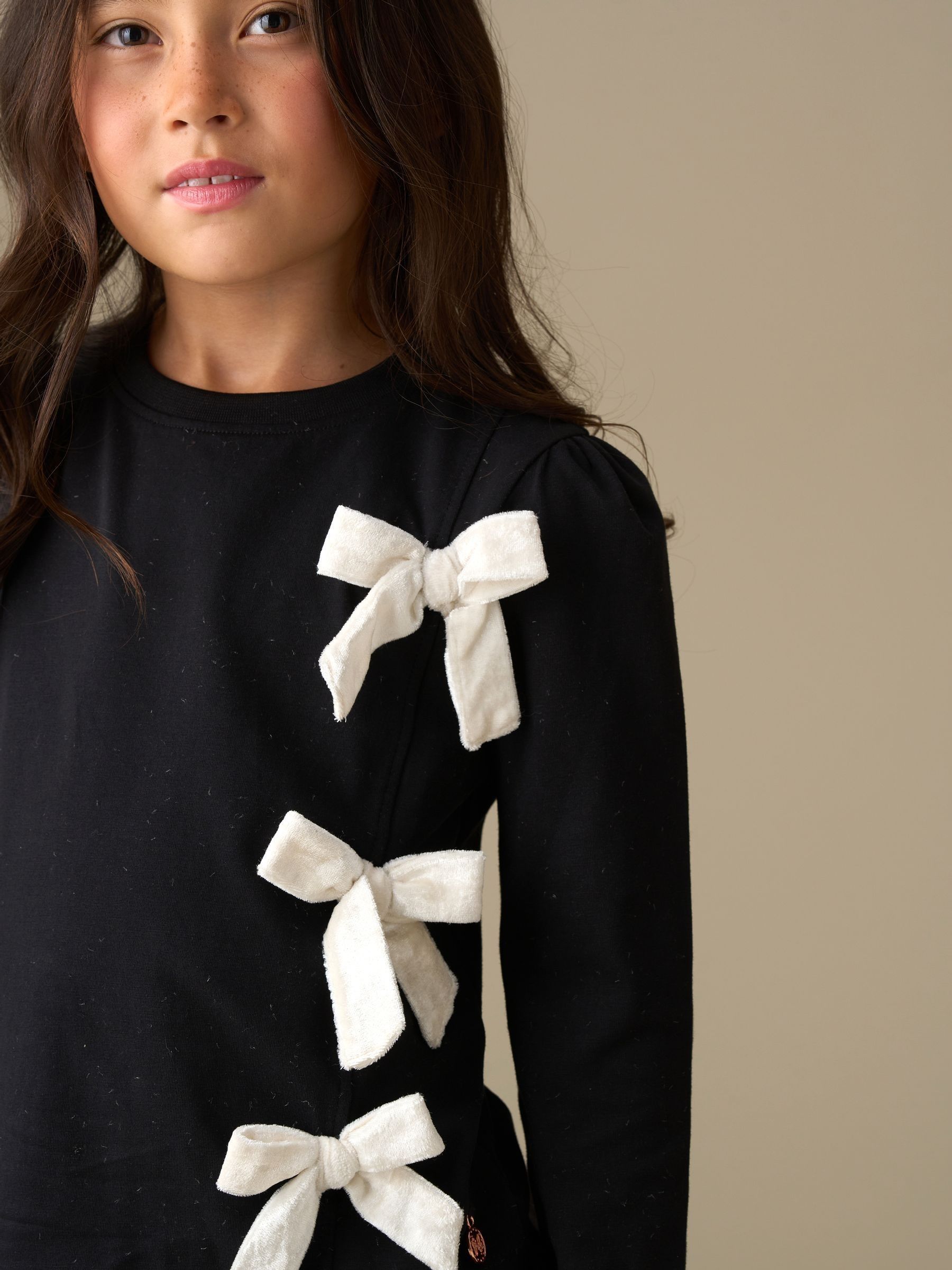 Angel & Rocket Eliza Asymmetric Bow Long Sleeves Top