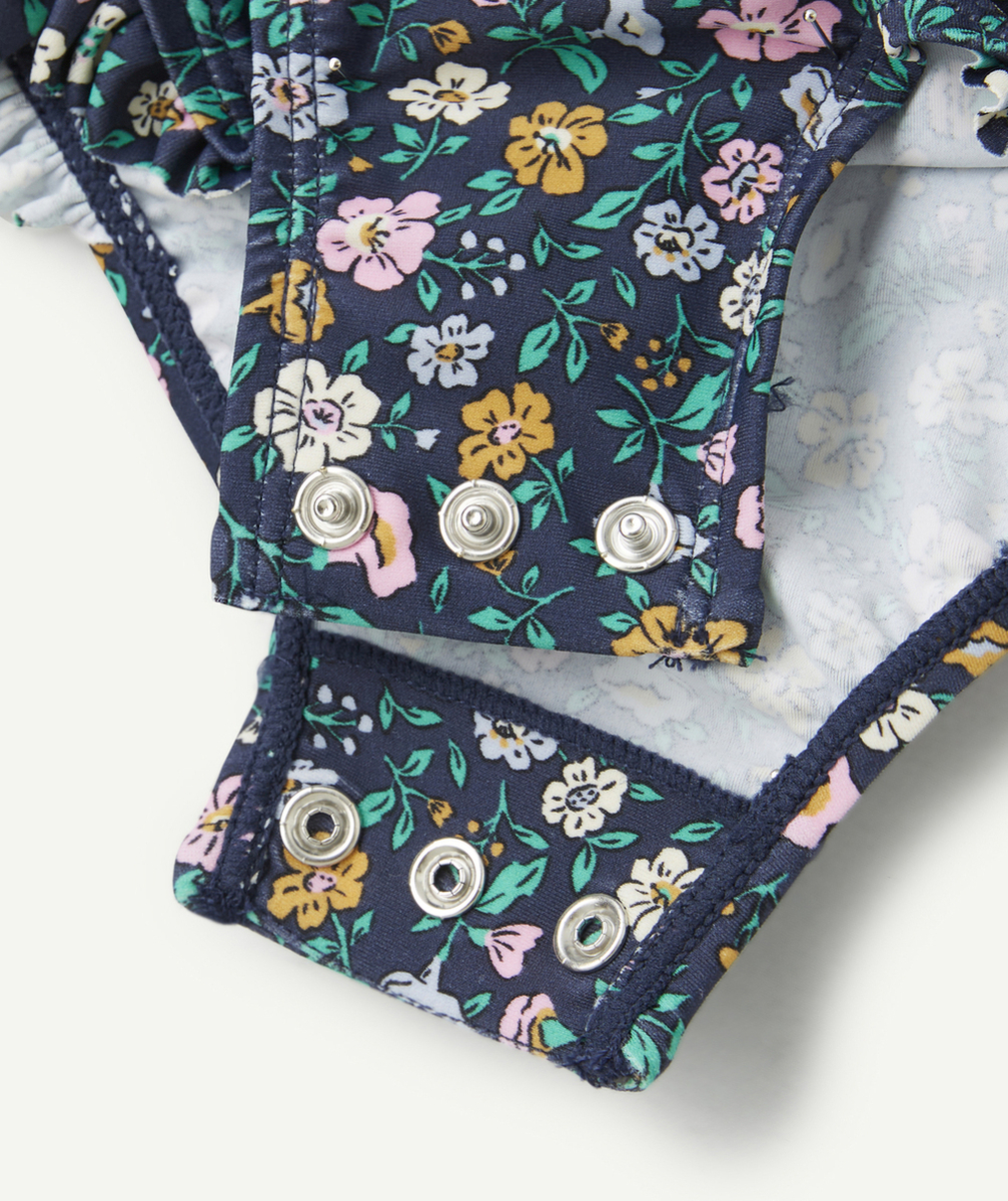 COMBINAISON ANTI-UV BÉBÉ FILLE EN FIBRES RECYCLÉES BLEU AVEC IMPRIMÉ FLEURI