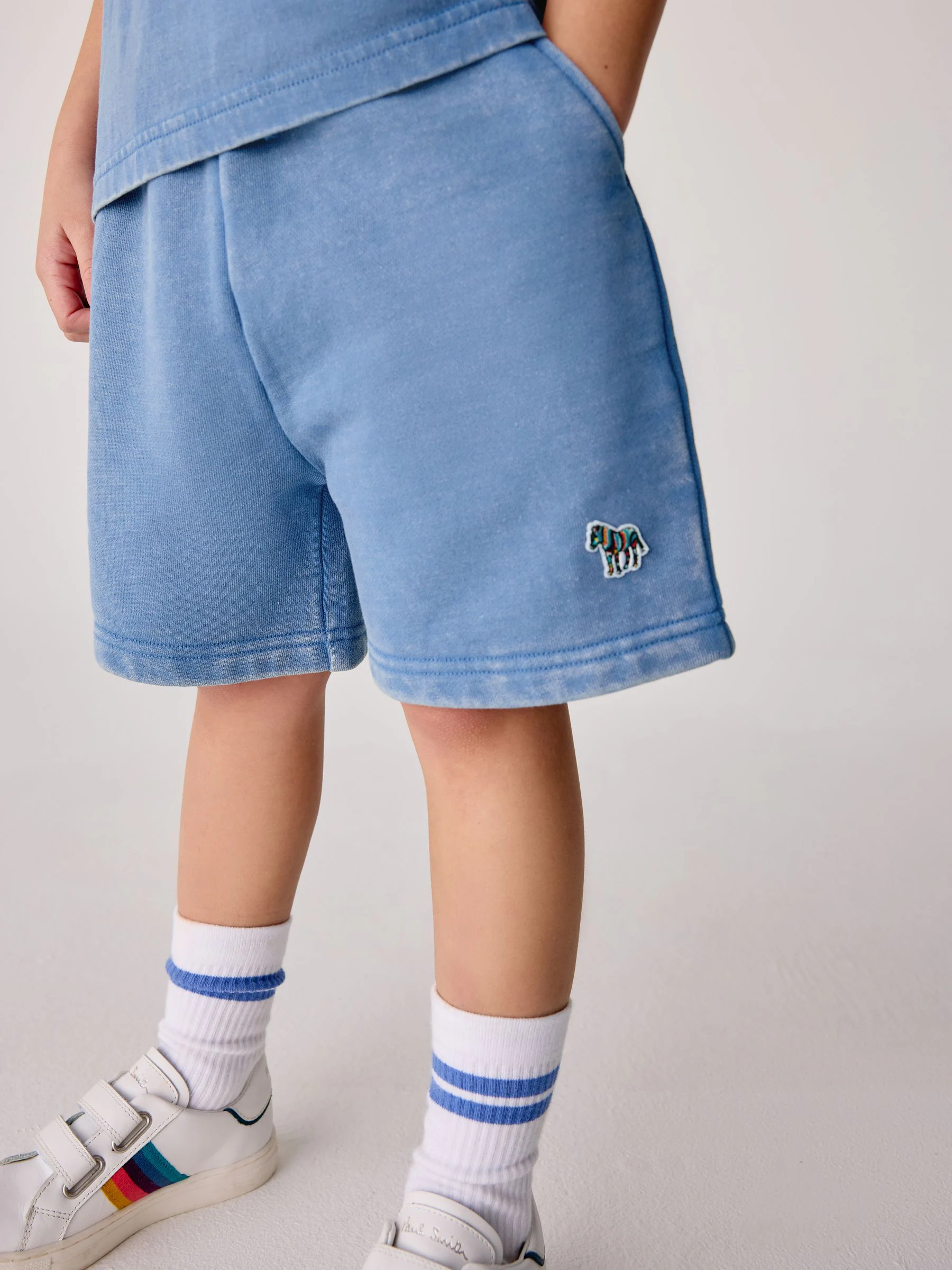 Blauwe wassing - Paul Smith Junior set van top en shorts voor jongens