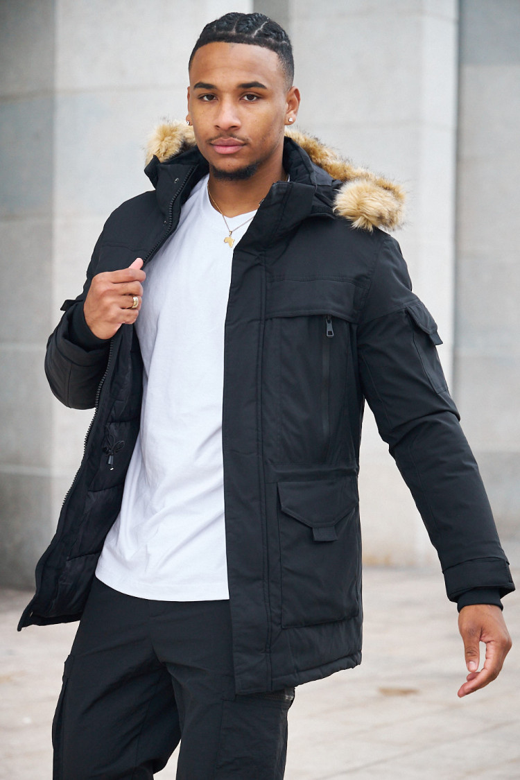 Parka bi-matière noire à capuche en fourrure