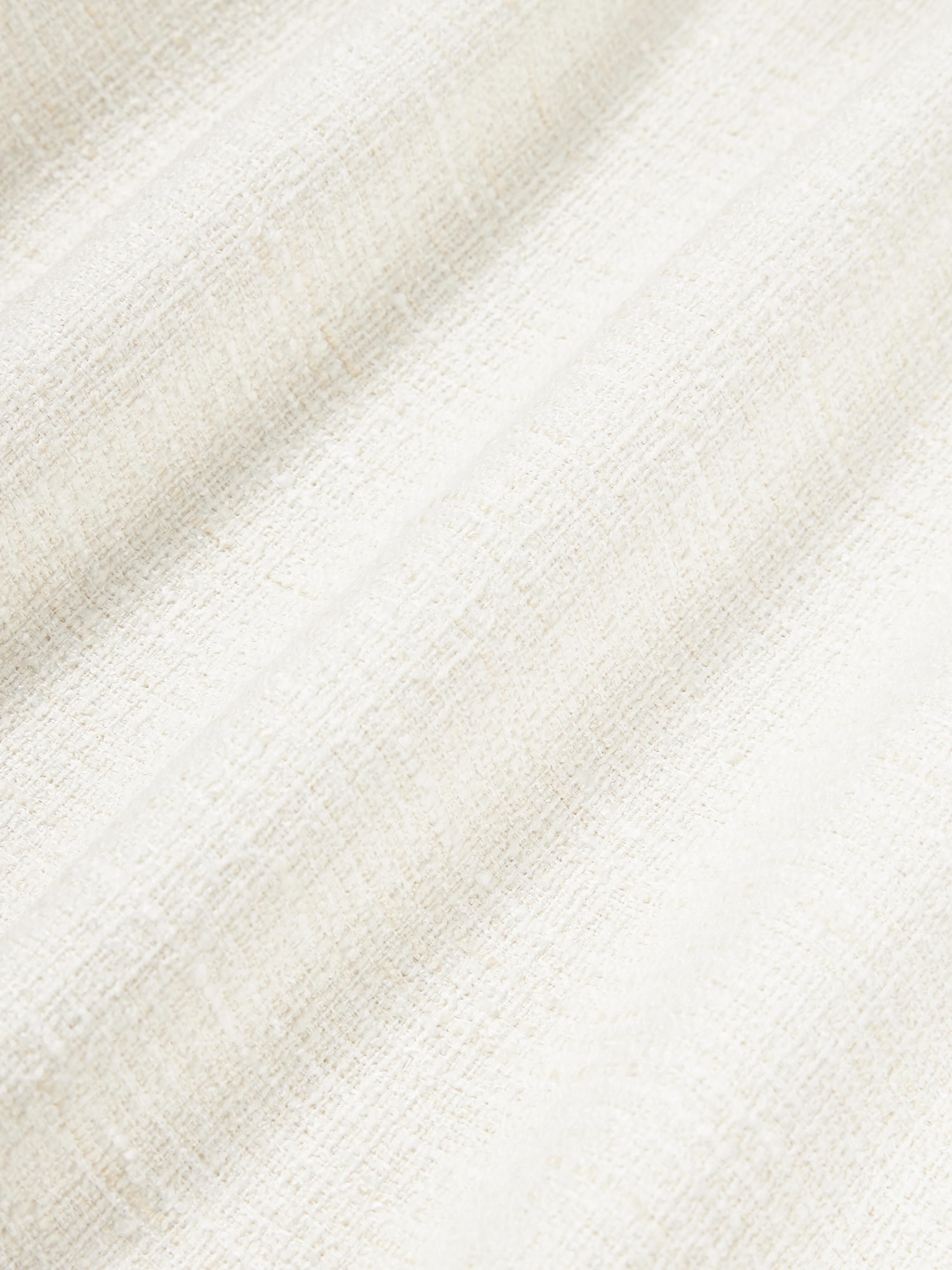 Bouclé kussenhoes Talea