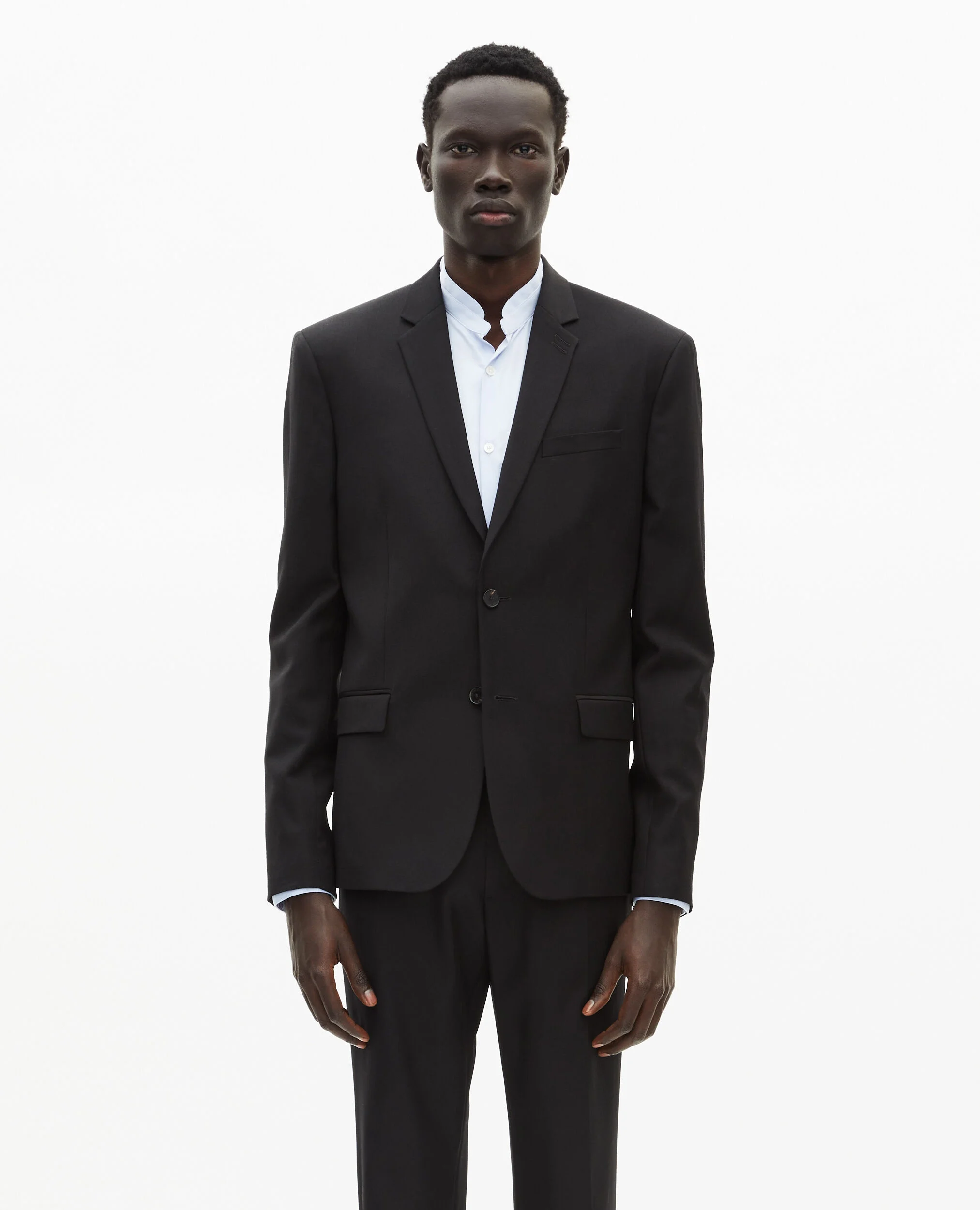 Veste de costume en laine noire coupe tailleur ajustée