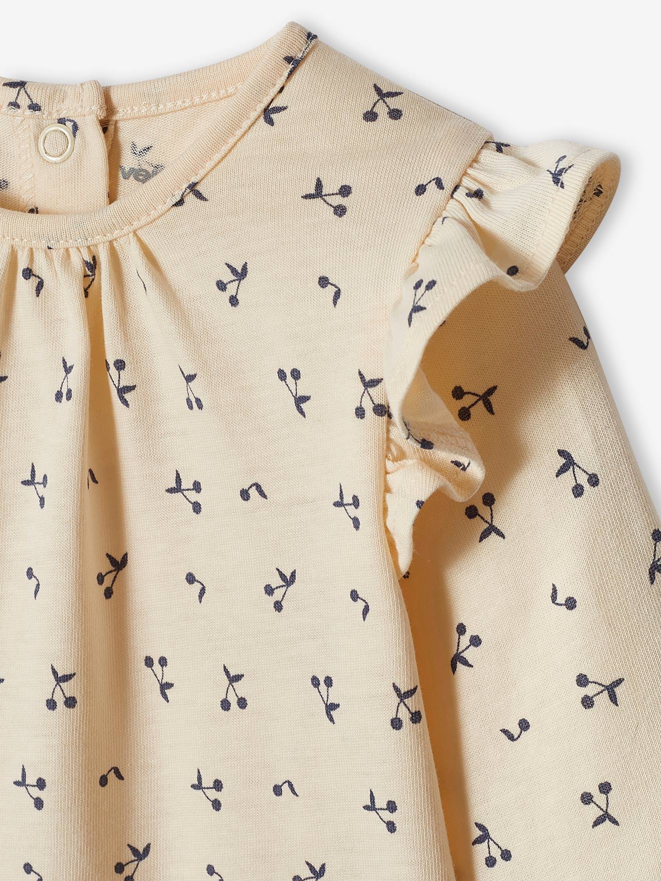 Conjunto de 2 camisetas básicas de manga comprida para bebês na cor amarelo claro.
