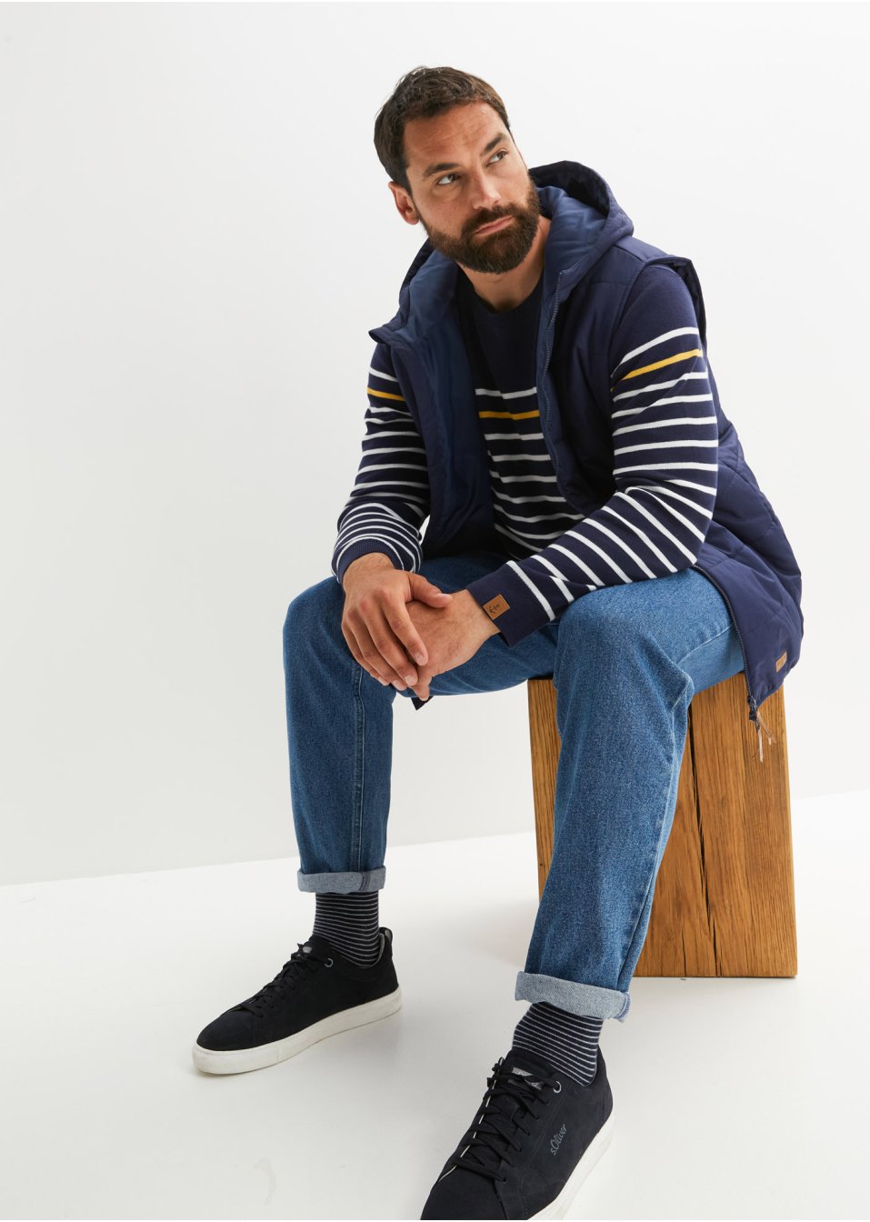 Veste sans manches matelassée à capuche