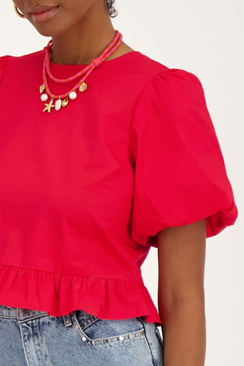 Rode blouse met pofmouwen en strikjes aan achterzijde