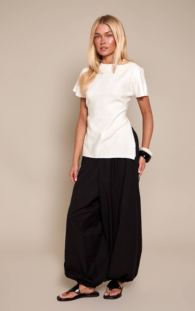 Crème T-shirt Tricoté À Col Rond Avec Fentes Latérales