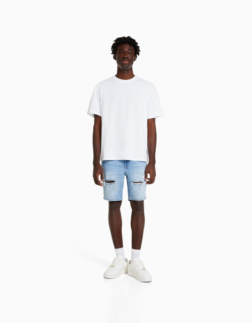 Bermuda jeans rasgada