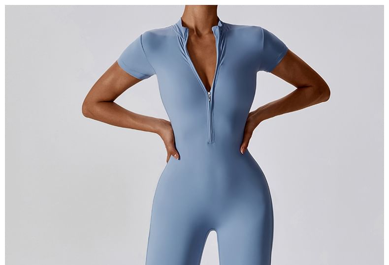 Skinniano - Sportjumpsuit met korte mouwen en halve rits