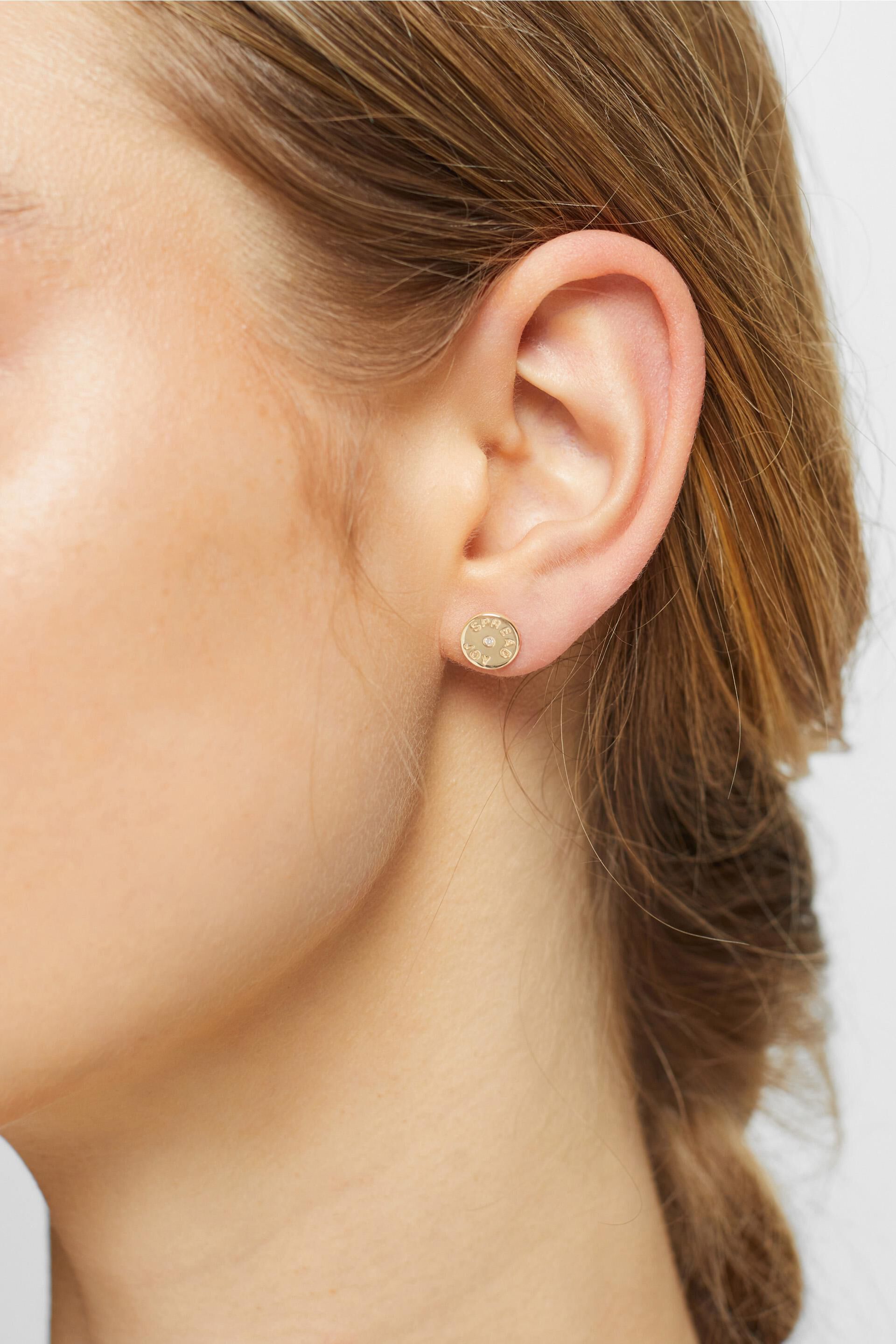 Clous d’oreilles ornés d’un diamant, argent sterling