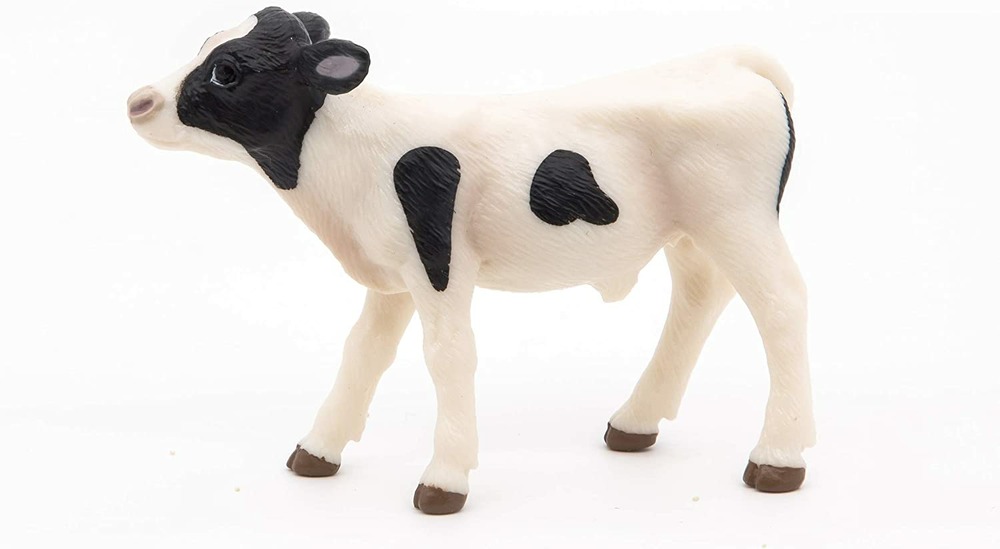 Figurine veau noir et blanc