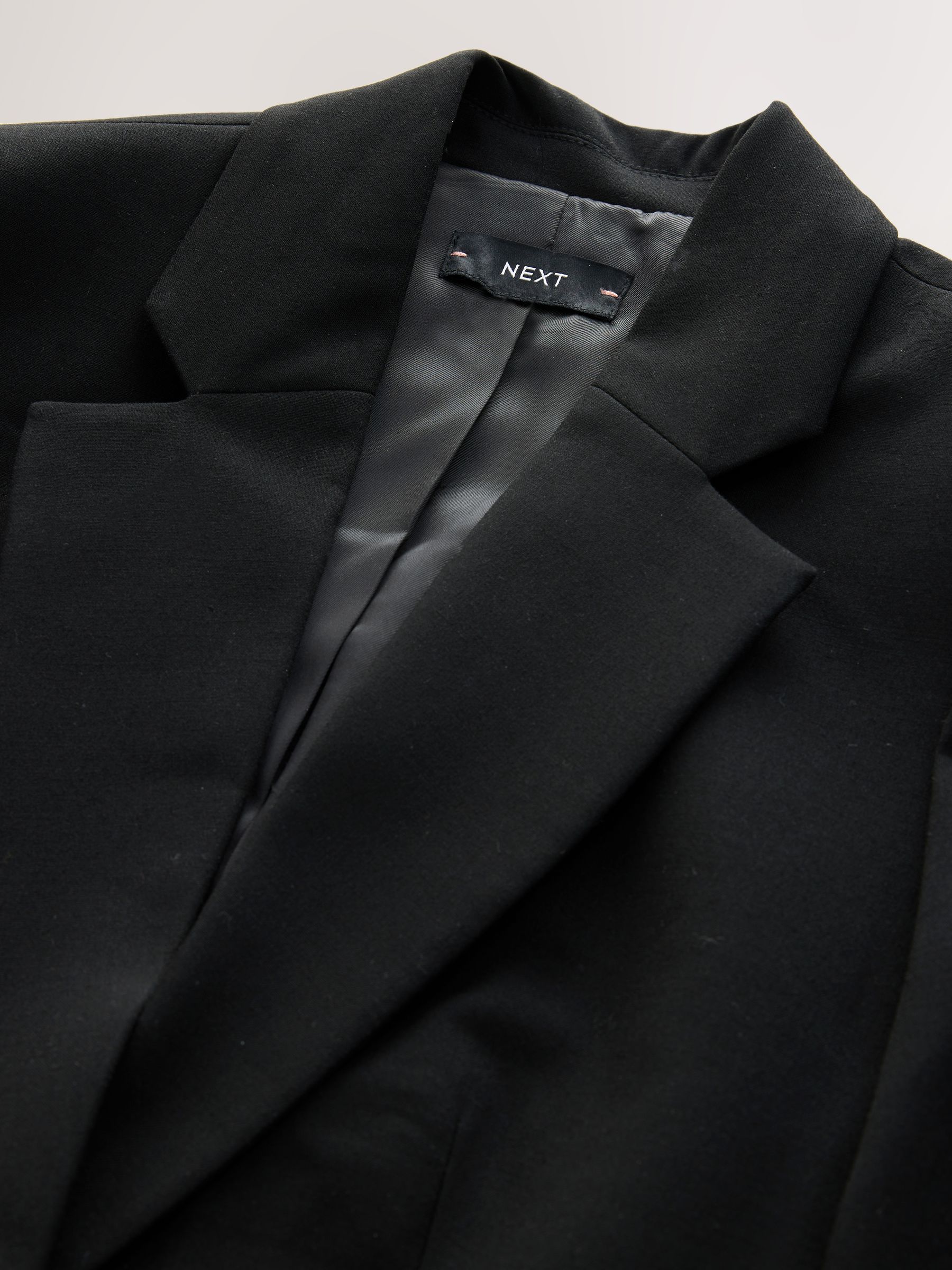 Zwart - Op maat gemaakte blazer met enkele rij knopen van wol