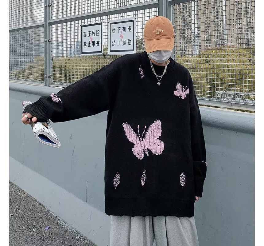 Shineon Studio - Oversized trui met ronde hals en vlinderprint