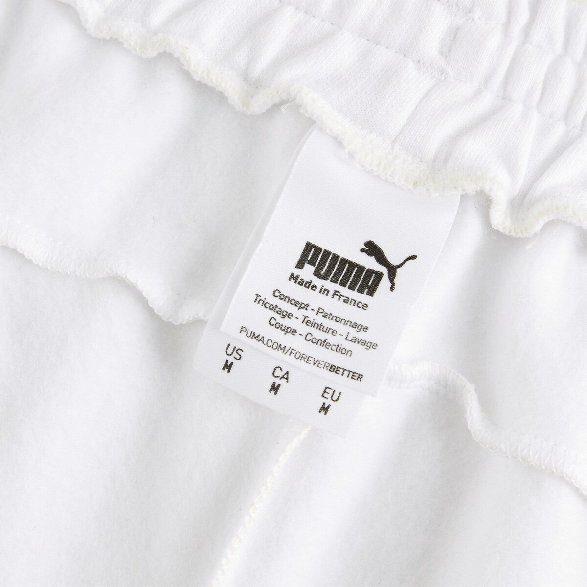 Calças unissex PUMA, fabricadas na França.