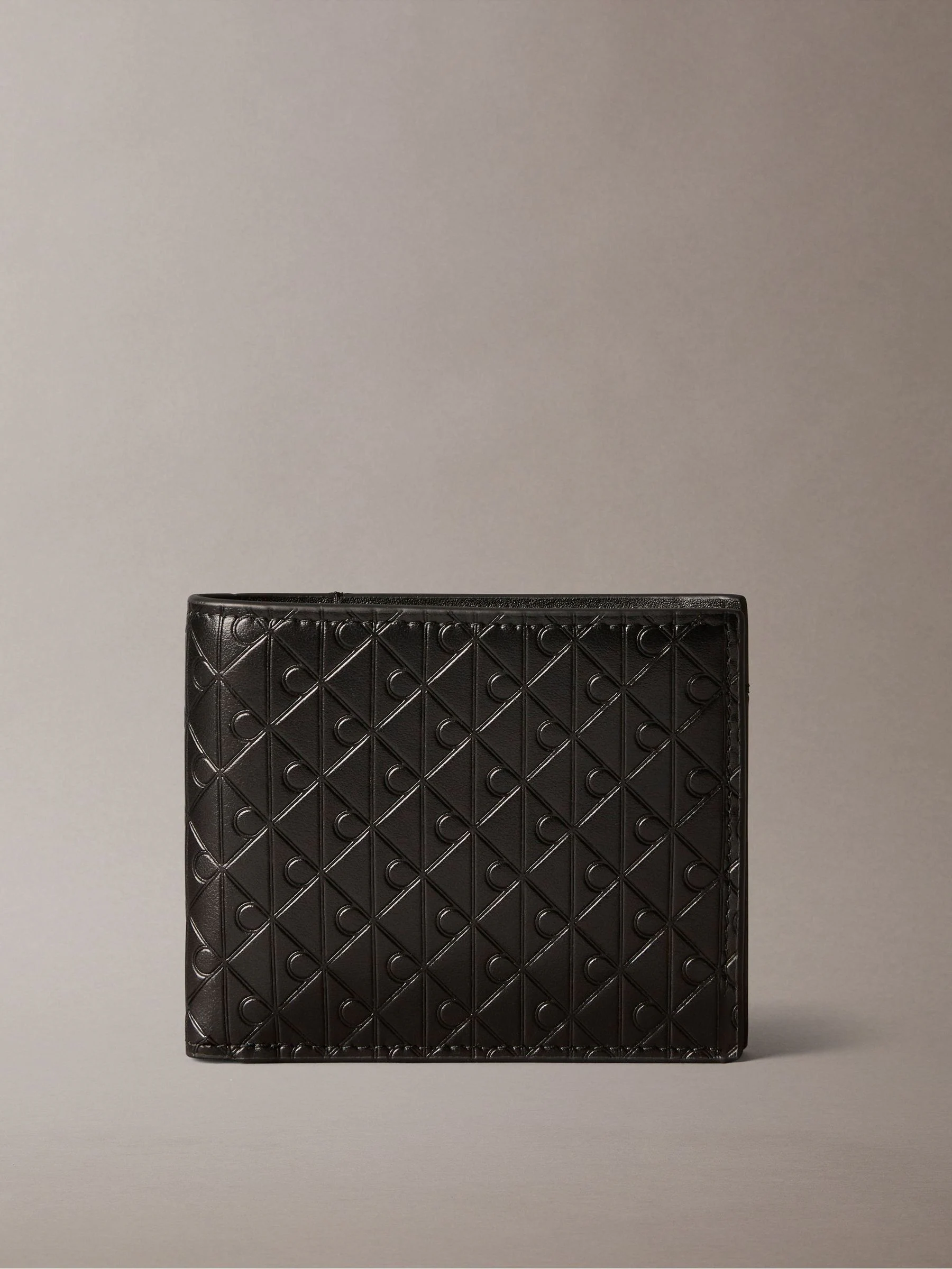Calvin Klein Embossed Allover Monogram Bifold Wallet with Coin Pouch