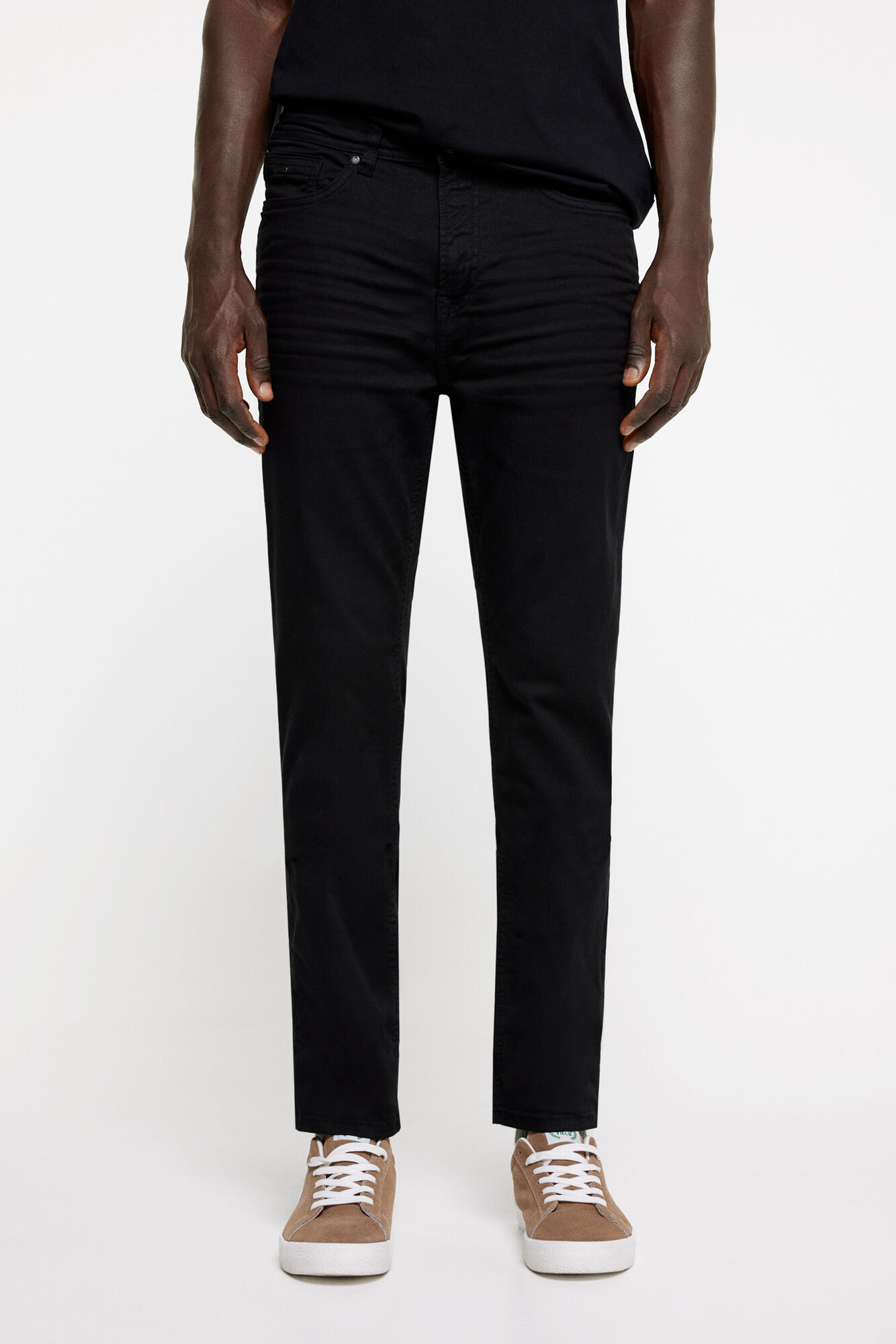 Calça skinny de cinco bolsos