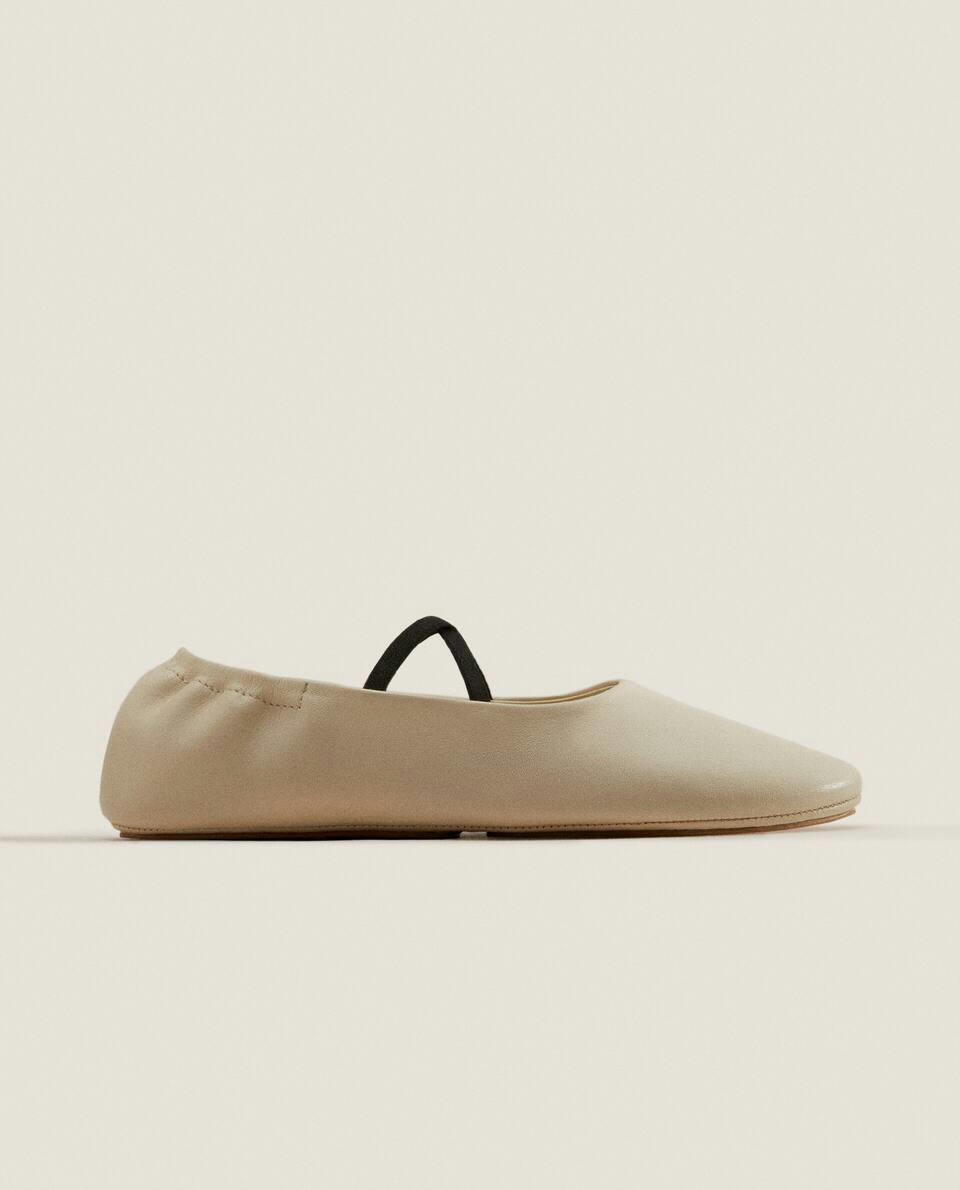 SAPATILHAS DE COURO COM DECOTE ALTO