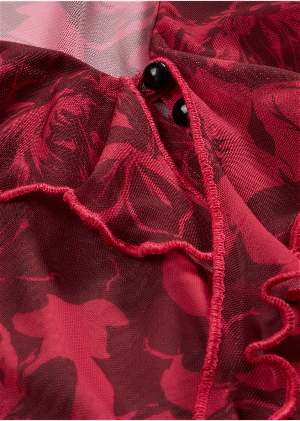 Blouse en résille à volants