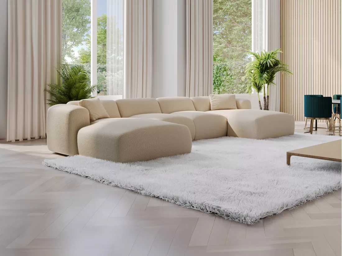 Grand canapé d'angle panoramique en tissu texturé beige POGNI de Maison Céphy