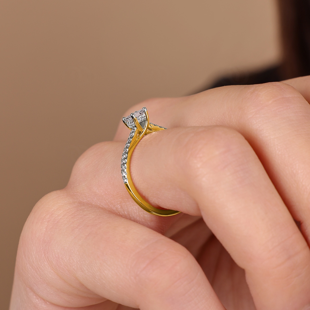 0.50ct Diamanten Pavé Solitärring 750/18 K Gelbgold