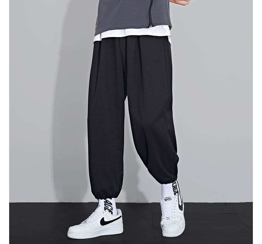 Acrius - Effen cropped harem-joggingbroek met trekkoord in de taille