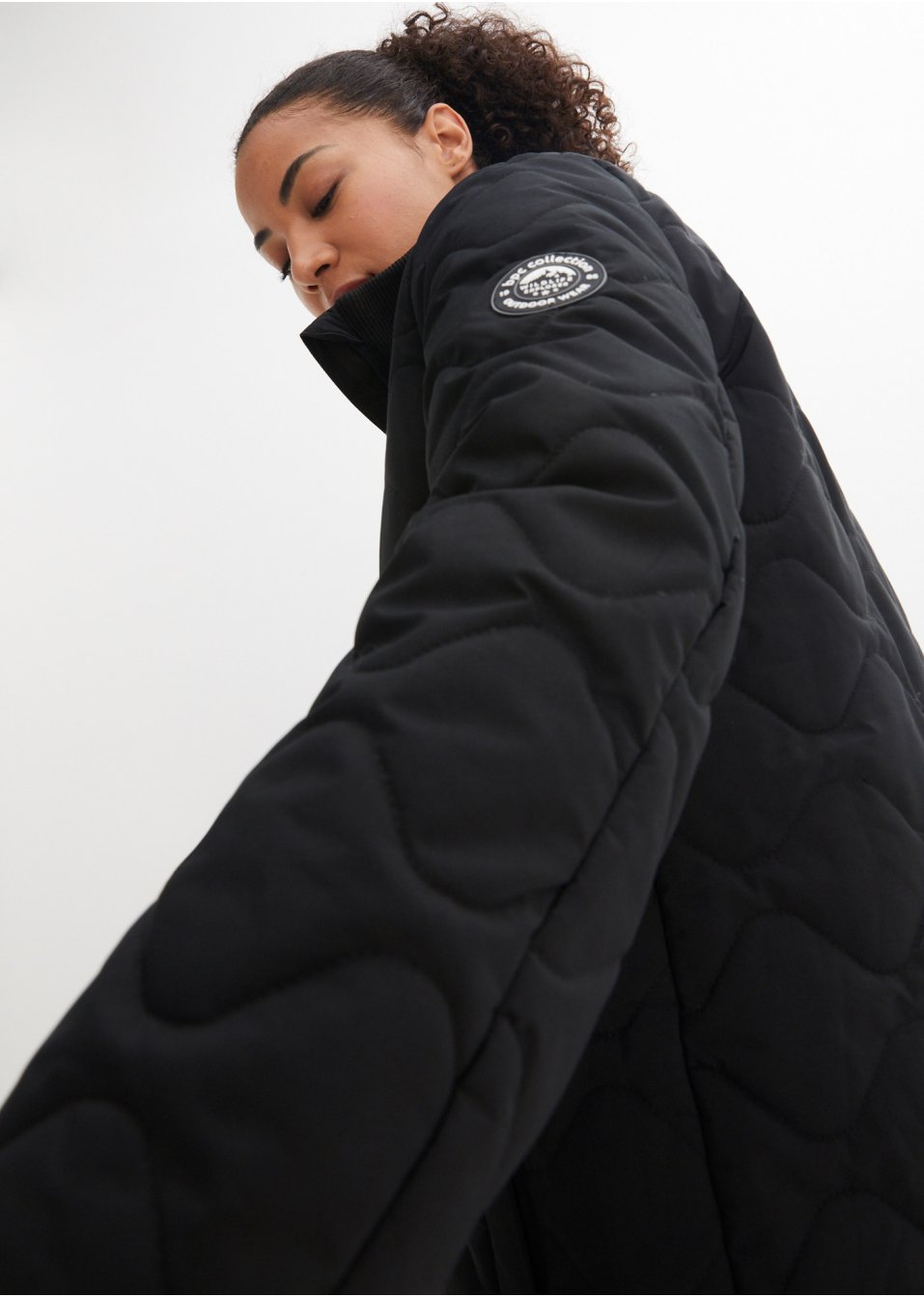 Manteau matelassé ultra-léger avec pochon