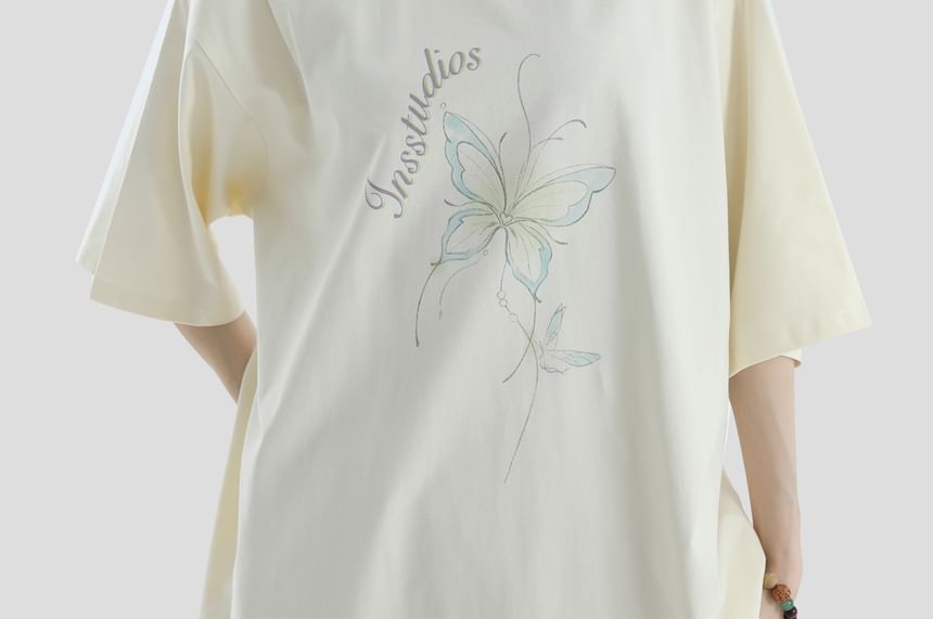 Banash - Oversized T-shirt met korte mouwen, ronde hals en vlinderprint