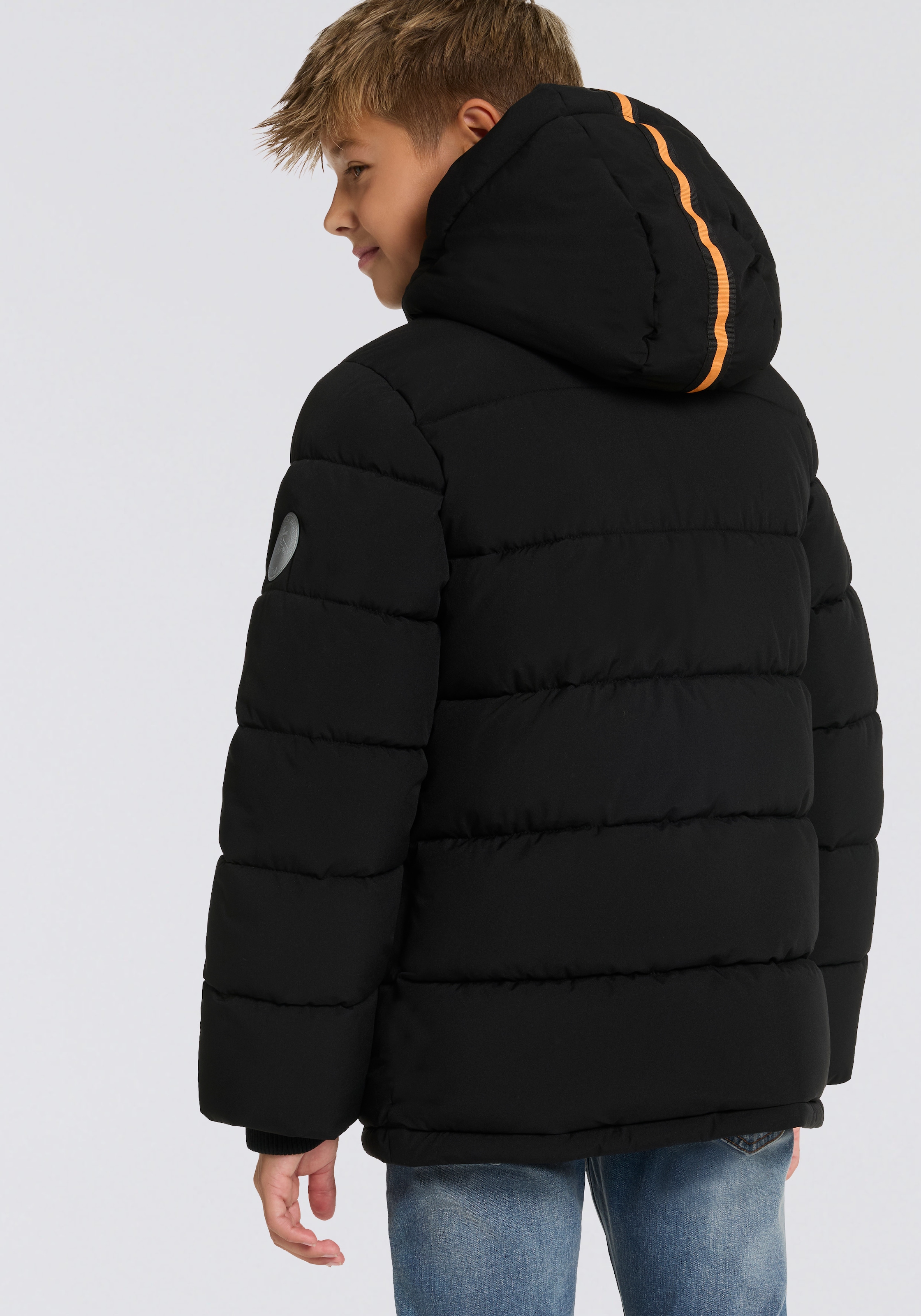 KIDSWORLD Outdoorjacke »Winterwarme Jacke, gesteppt« mit Kapuze Trendige Winterjacke mit refklektierenden Details