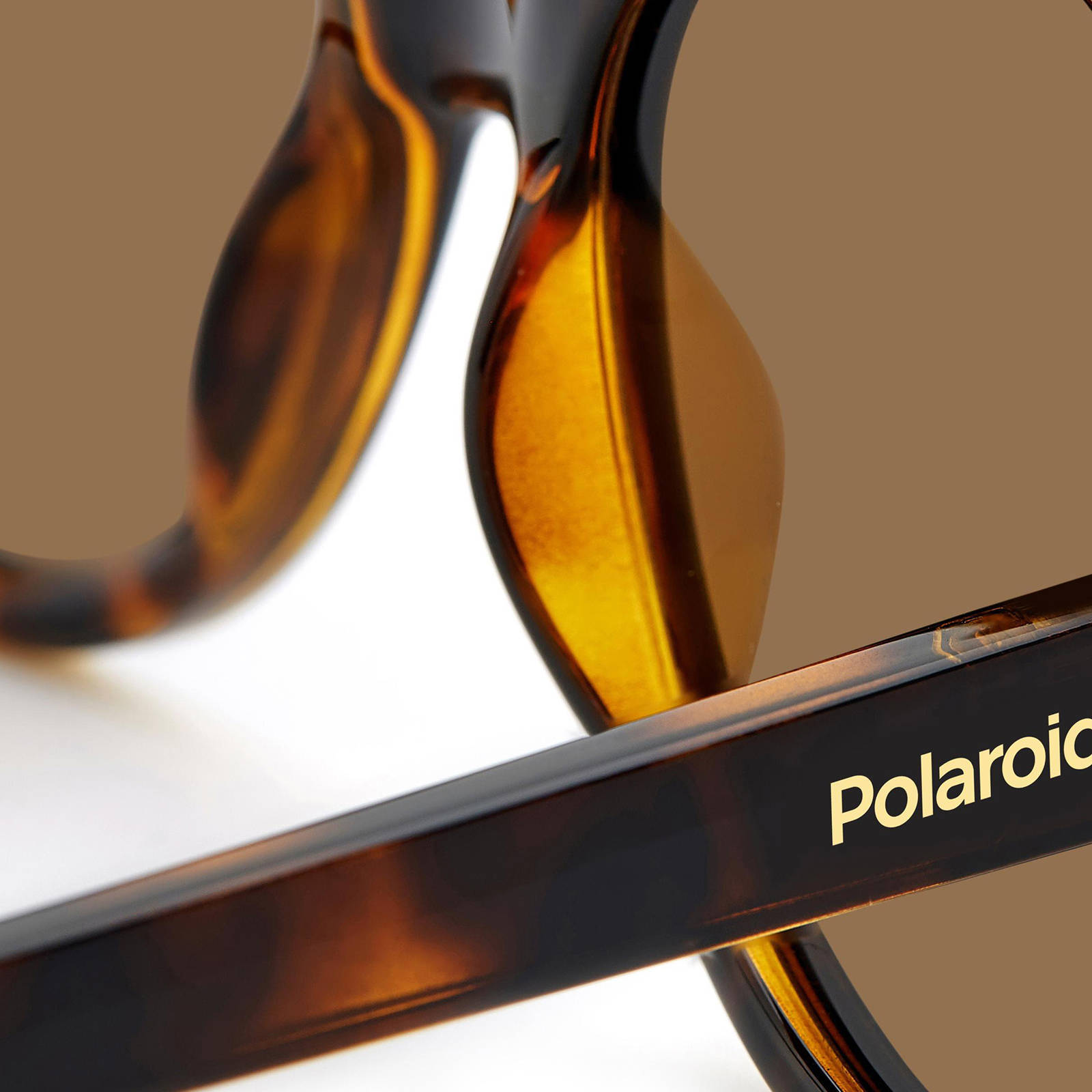 Polaroid zonnebril 4154/S/X met tortoise print bruin