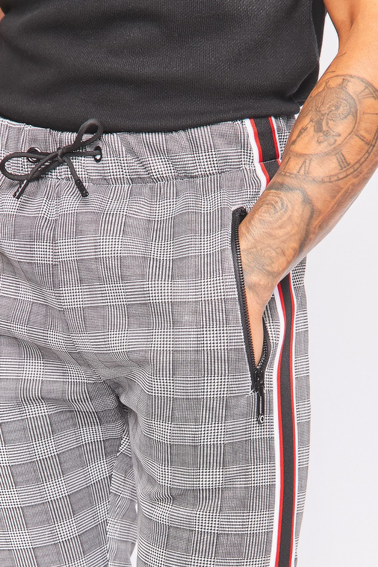 Pantalon de jogging à carreaux et bandes