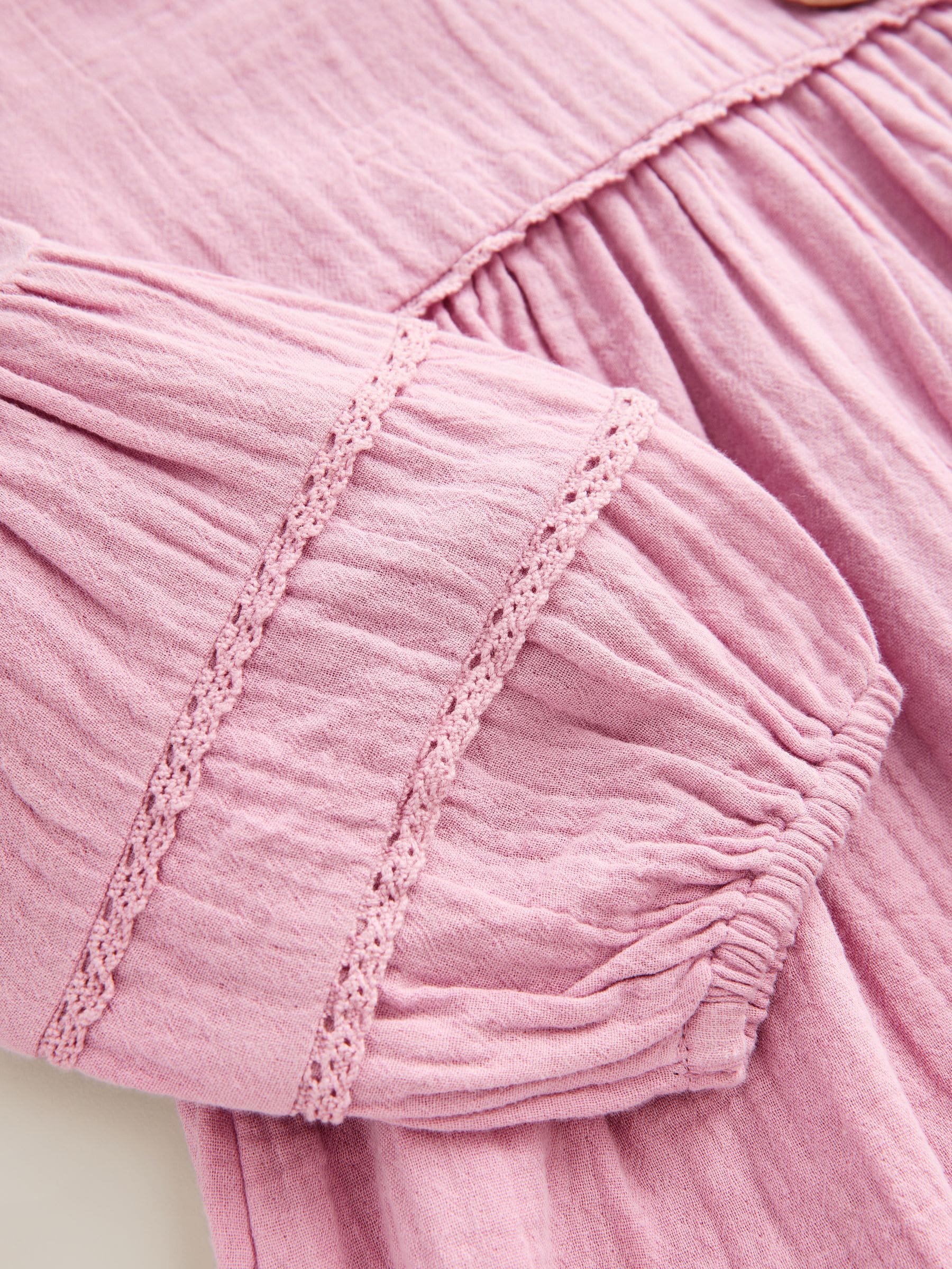 Roze met figuurtjes - Jurk met textuur (3 mnd - 8 jr)