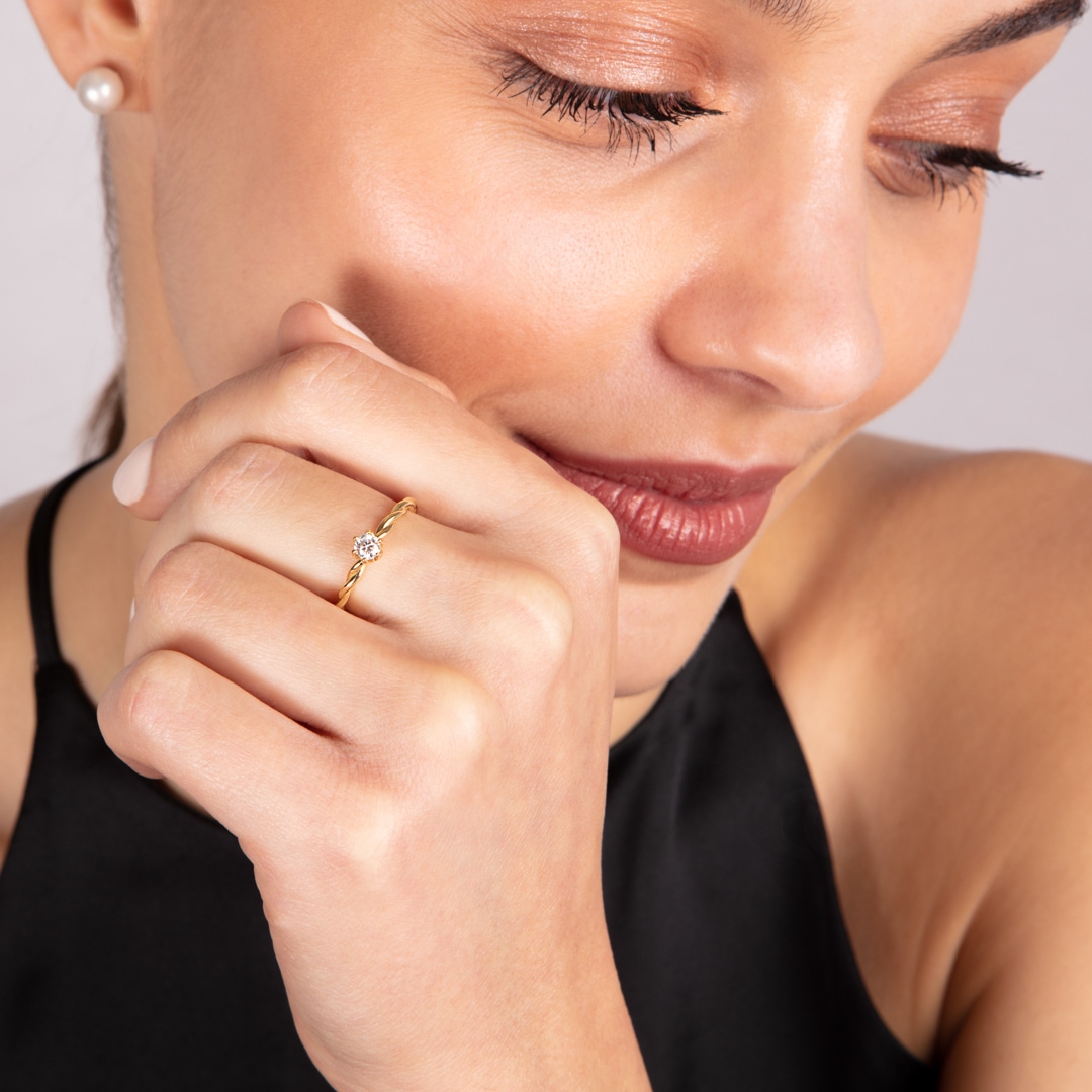 Kordelring 750/18 K Gelbgold mit Diamant 0.23 ct H/si