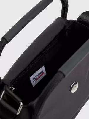 Bolsa transversal com aba e emblema