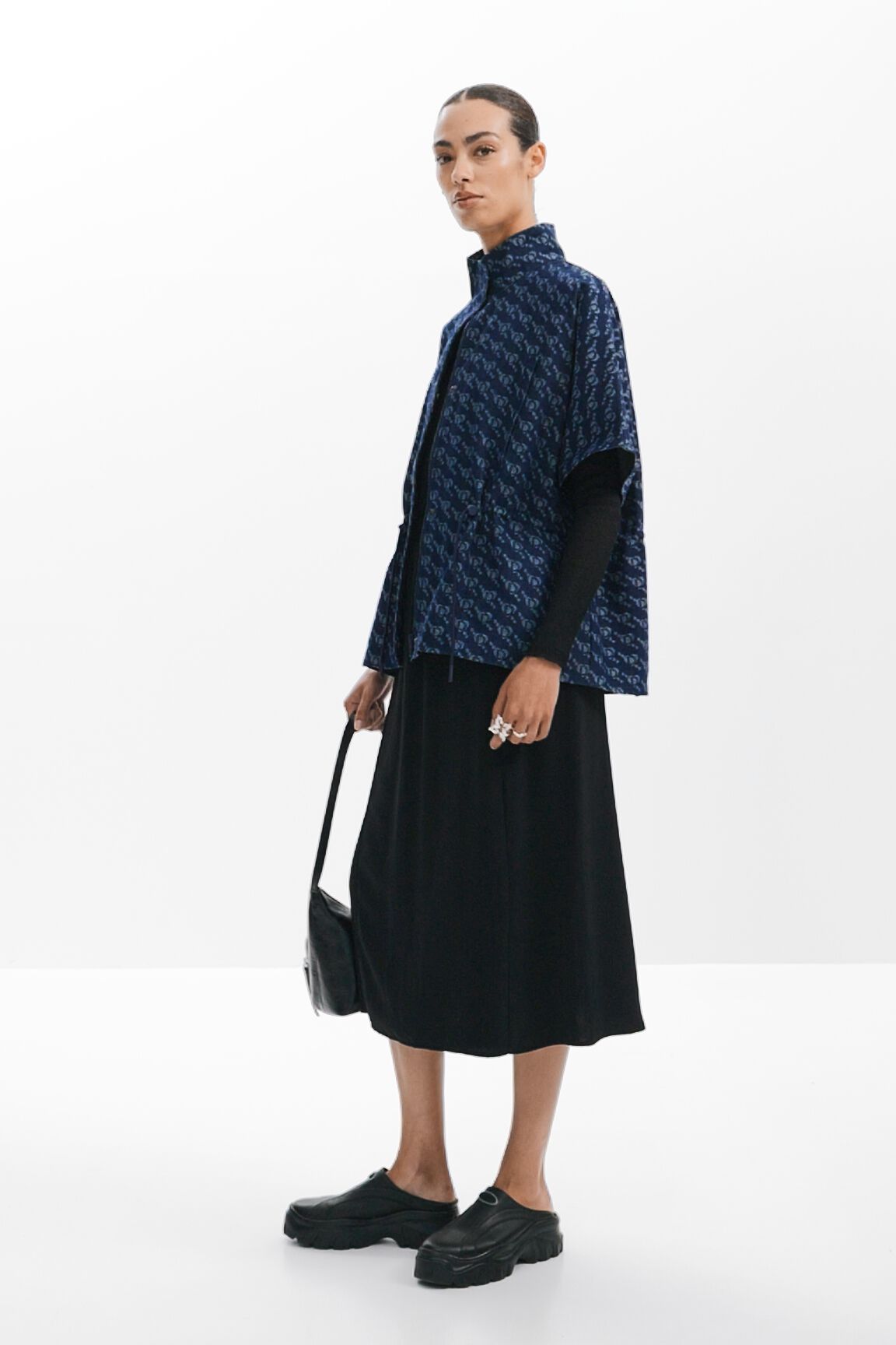 Poncho com estampa geométrica