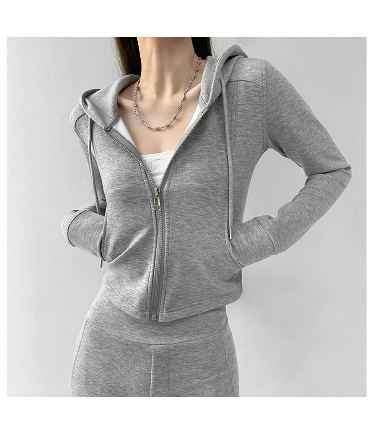 Shira - Cropped sweatshirt met capuchon / High-rise flared joggingbroek