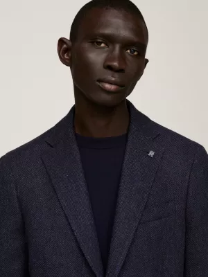 Blazer de lã com trama espinha de peixe e corte slim.