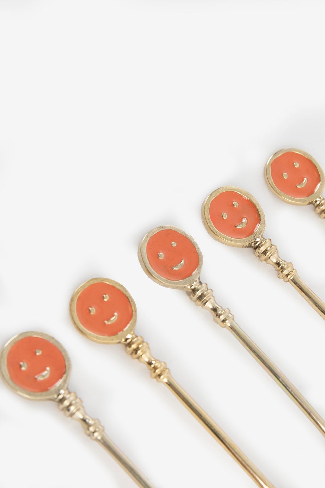 Messing theelepels met smiley