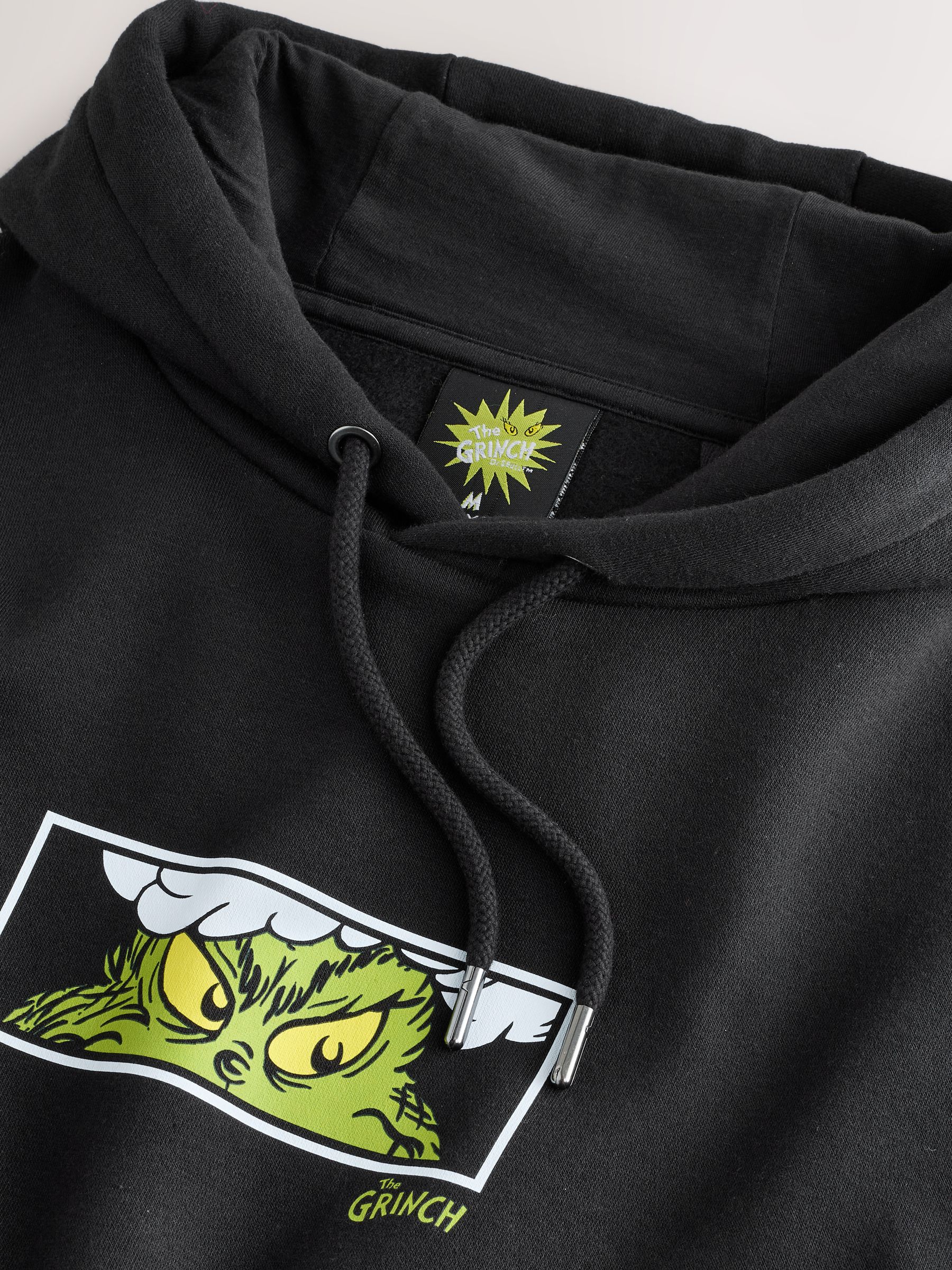 Zwart - Overhead Hoodie met Grinch Kerstmisafbeelding