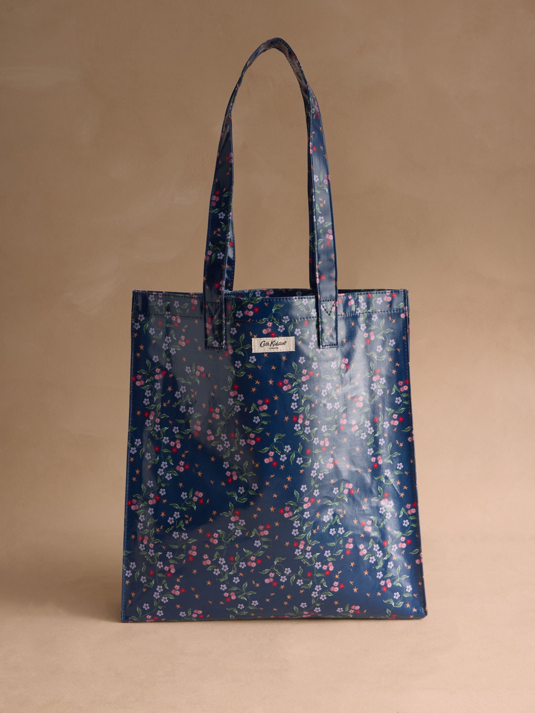 Marineblauwe ster met lenteprint - Cath Kidston grote boekentas