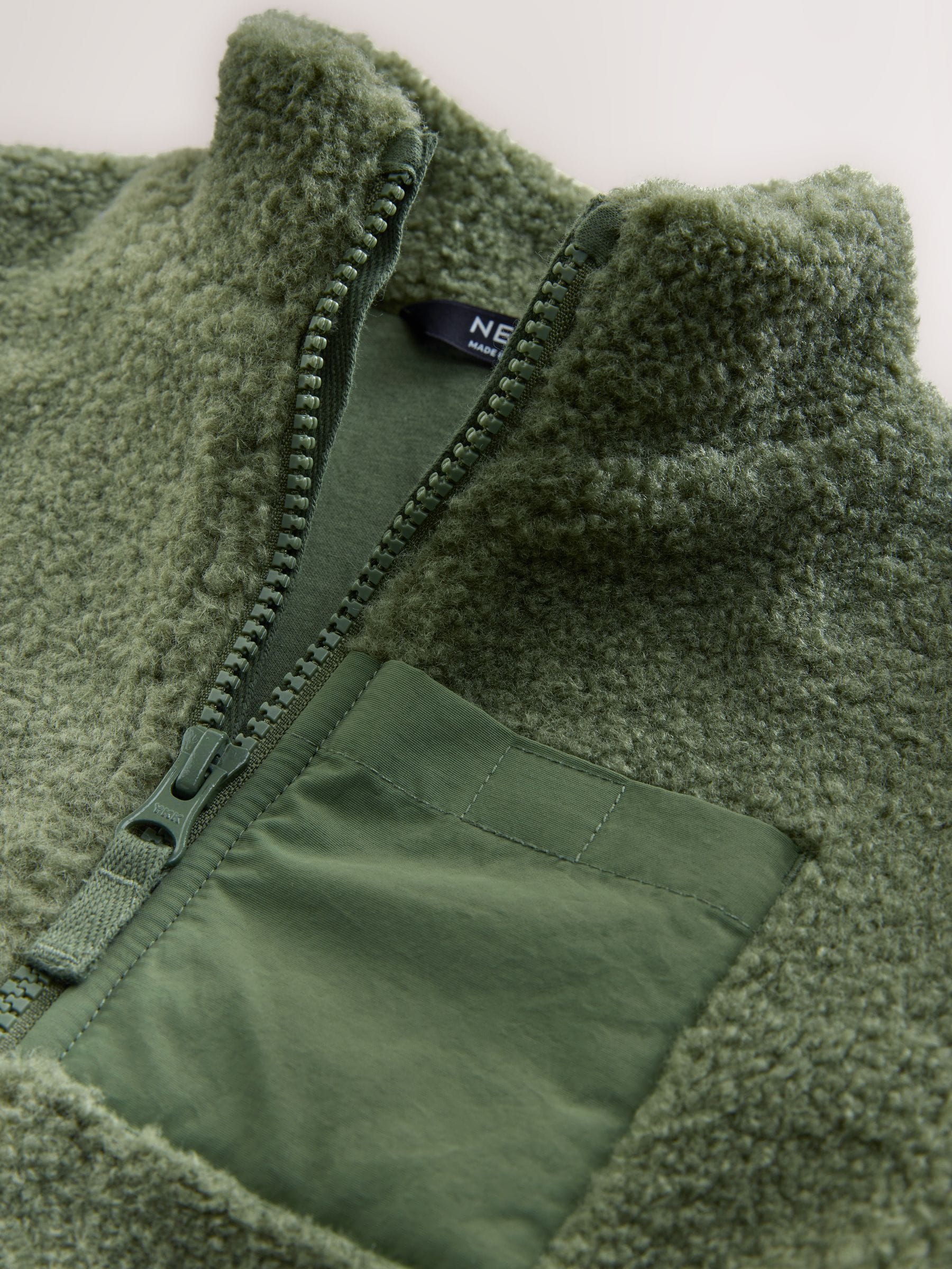 Mineraalkleurig - Effen fleece met rits en trechterhals (3mnd-7jr)