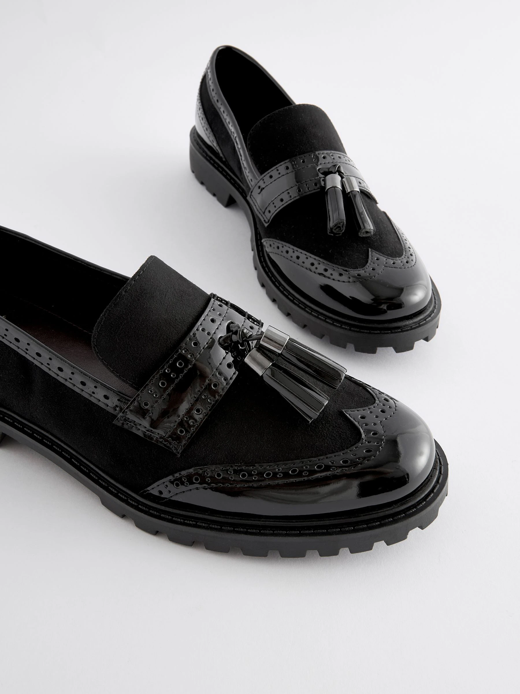 Zwarte mix - Loafers met dikke zool met profiel en kwastjes