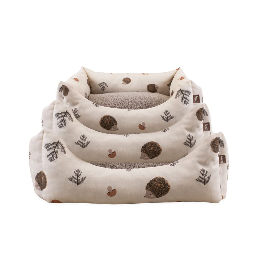 Cama para cães Leeby com capa removível, branca e com ouriços.