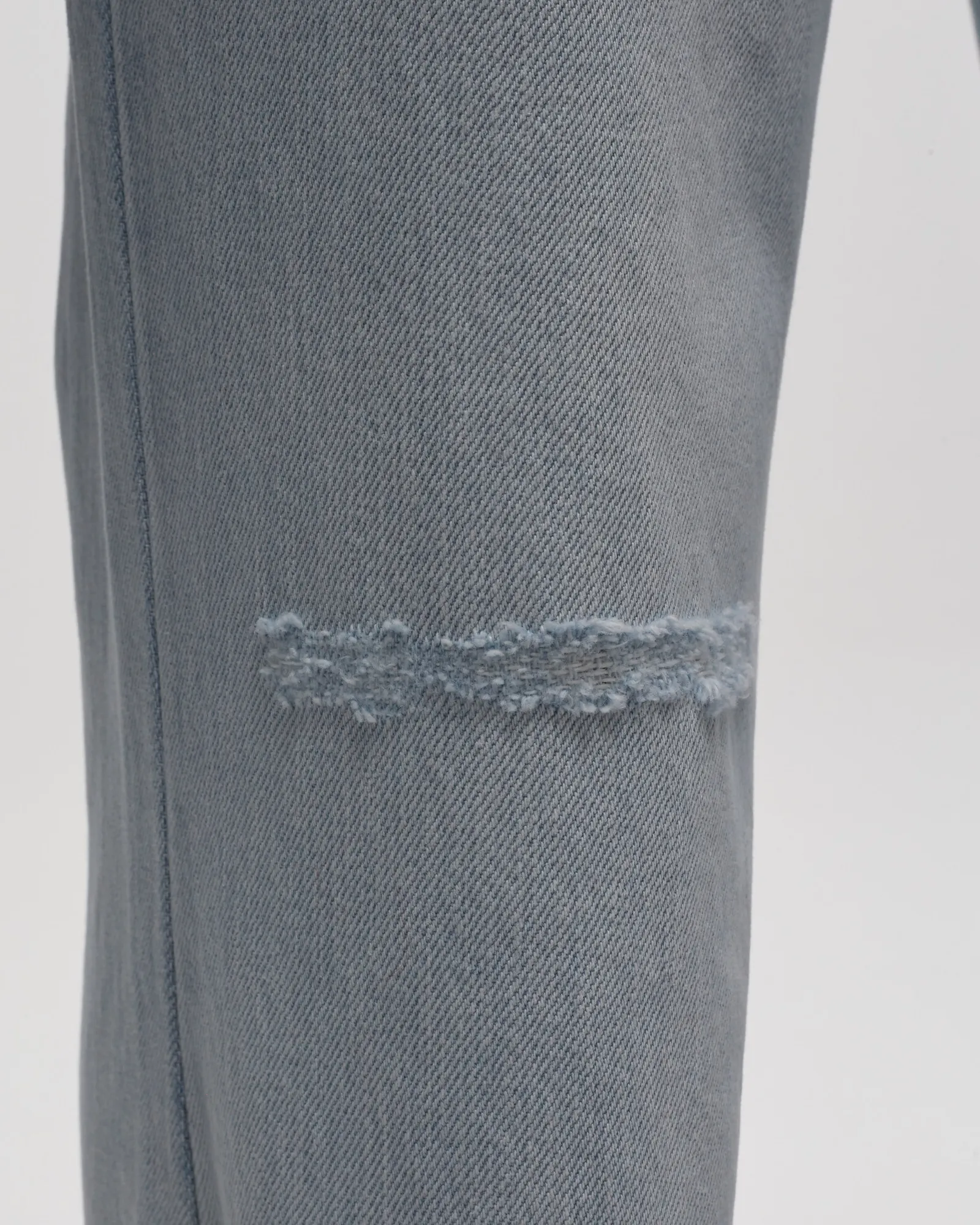 ERL DISTRESSED DENIM PANTS WOVEN