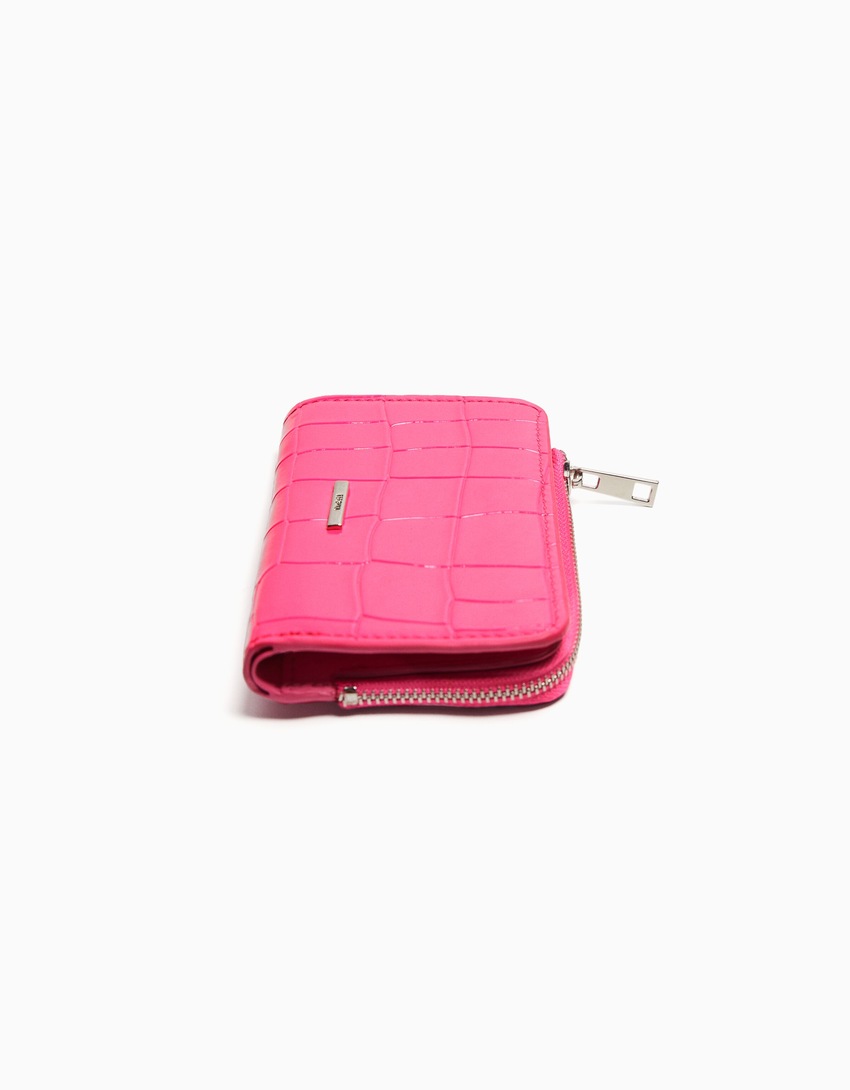 Bolsa com estampa animal em imitação de verniz em relevo