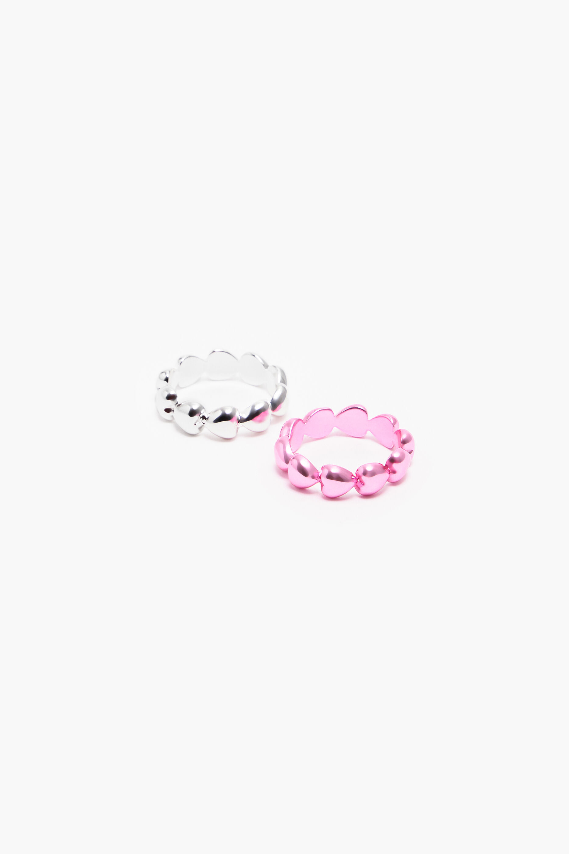 Conjunto de anéis em formato de coração rosa