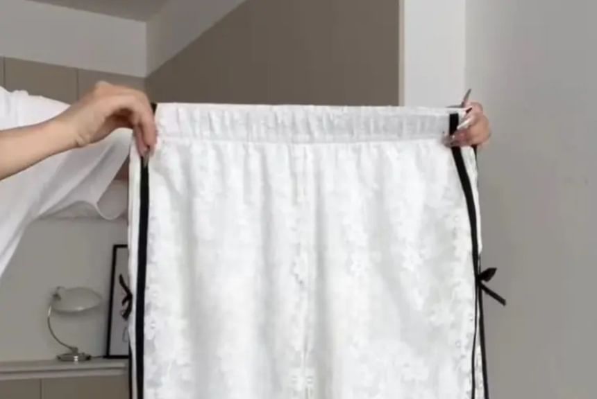 Essere - Elastische taille, bloemenstrik, kanten wijde broek