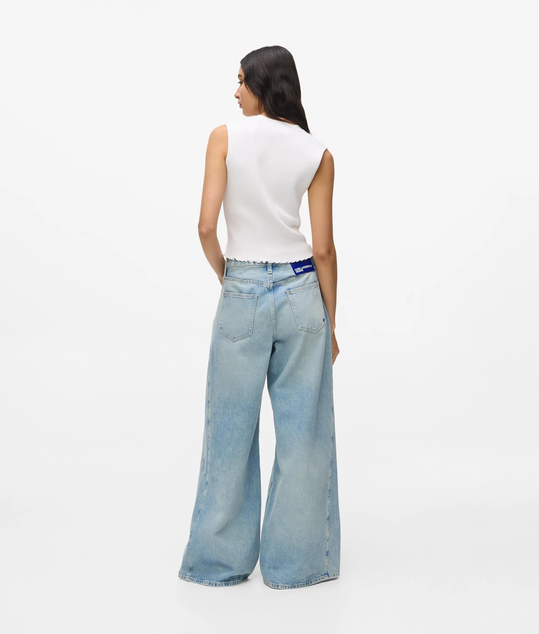 Laag model jeans met wijde pijpen en panelen