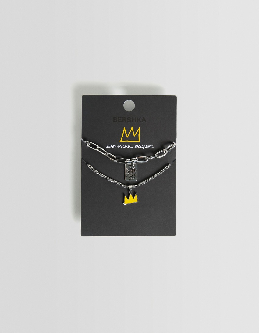 Conjunto de 2 colares com pingentes de Jean-Michel Basquiat