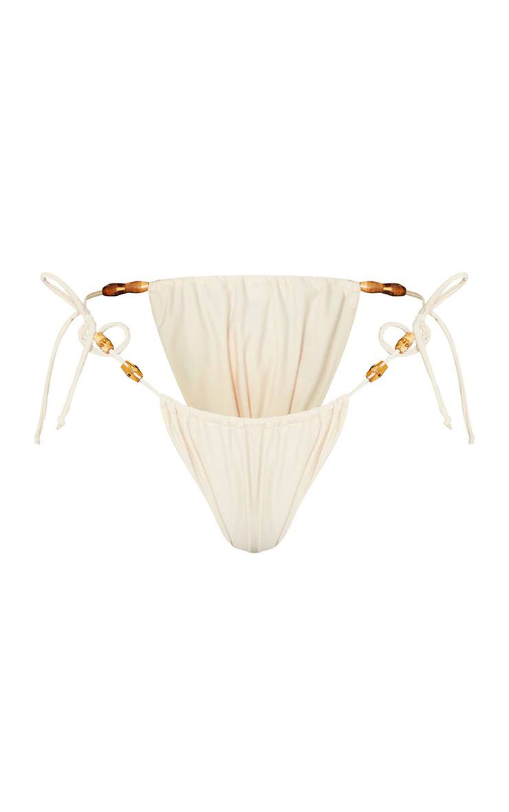 Sable Bas De Bikini À Liens Latéraux Froncés Avec Perles En Bois